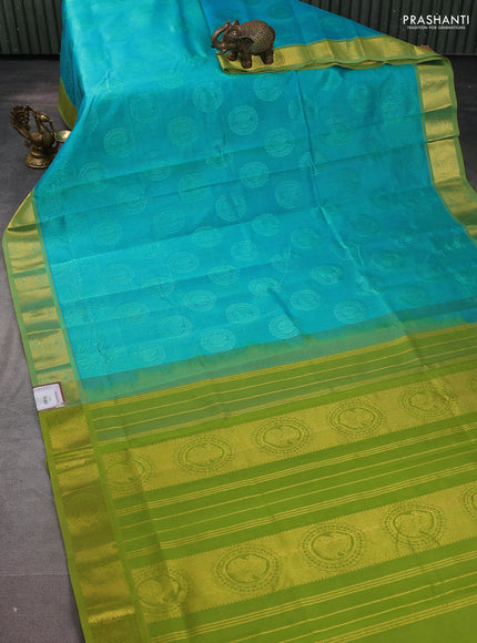 Silk cotton saree teal blue and light green with allover self emboss jacquard and zari woven border