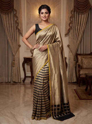 Banarasi tissue partly saree gold and black with plain body and piping border