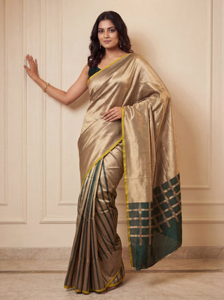 Banarasi tissue partly saree gold and green with plain body and piping border