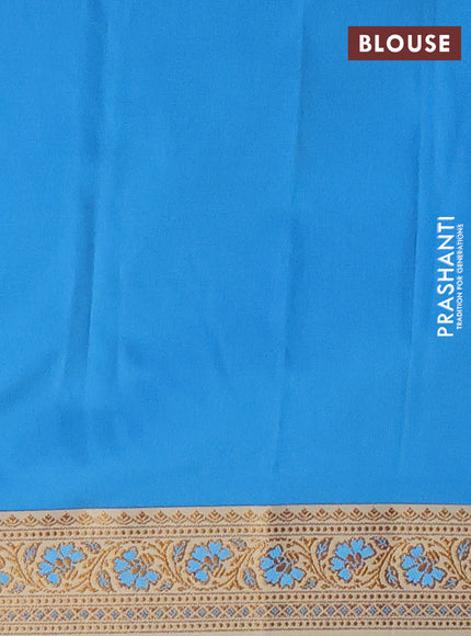 Semi banarasi katan saree cs blue and cream with plain body and zari woven border