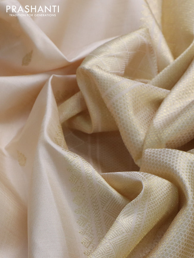 Pure kanchipuram silk saree cream with zari woven buttas and zari woven border