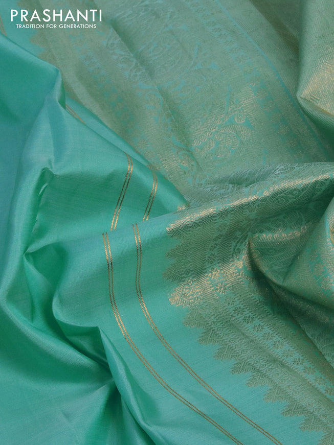 Pure kanchipuram silk saree light blue with zari woven buttas and long zari woven border