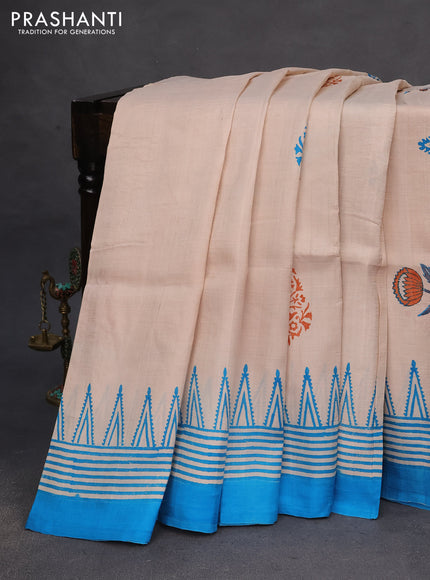 Bishnupuri silk saree pastel brown and cs blue with butta prints and printed border