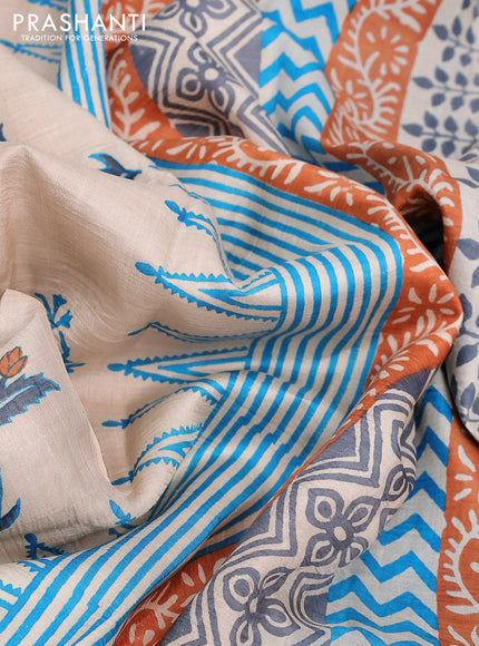 Bishnupuri silk saree pastel brown and cs blue with butta prints and printed border