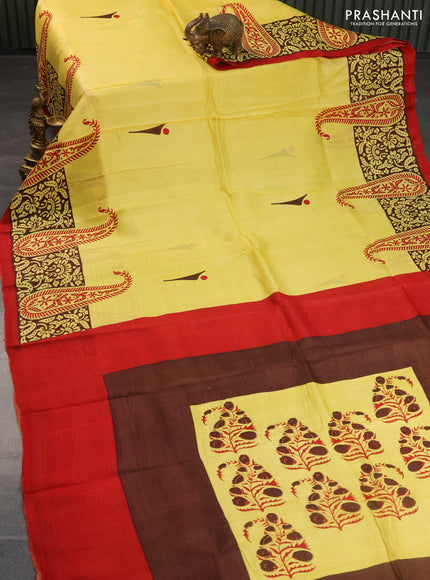Bishnupuri silk saree yellow and brown with butta prints and printed border