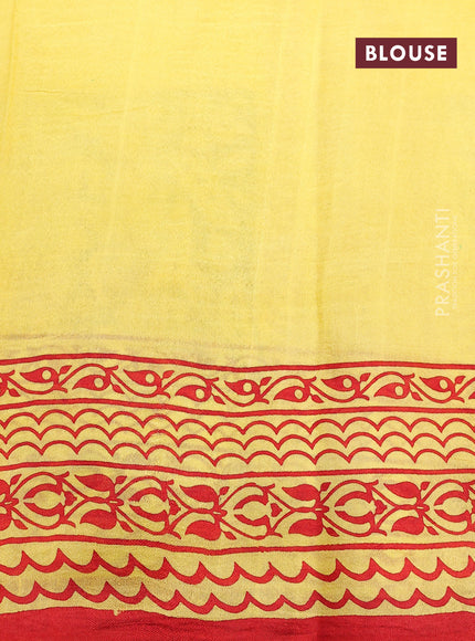 Bishnupuri silk saree yellow and brown with butta prints and printed border