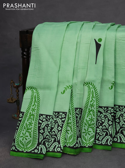 Bishnupuri silk saree pastel green and black with butta prints and printed border