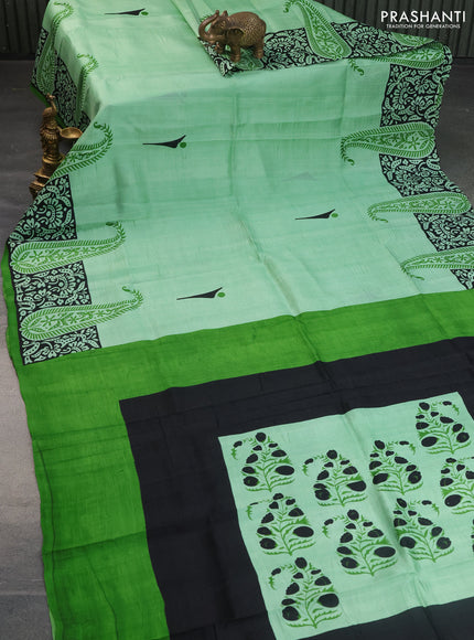Bishnupuri silk saree pastel green and black with butta prints and printed border
