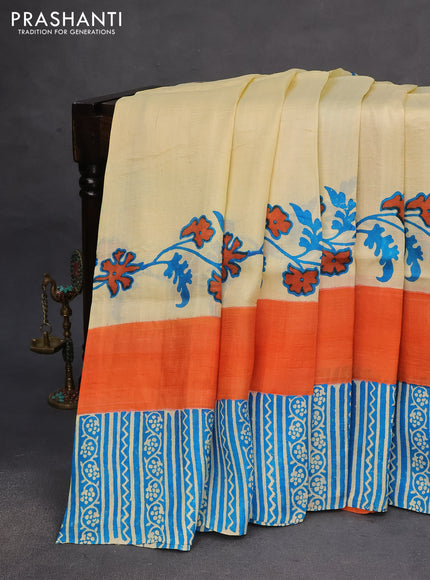Bishnupuri silk saree cream and orange cs blue with floral prints and printed border