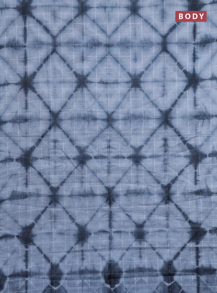 Semi bamboo saree pastel grey and elephant grey with allover batik prints & sequin work in borderless style