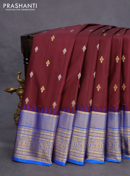 Pure gadwal silk saree deep maroon and blue with silver & gold zari woven buttas and long zari woven border