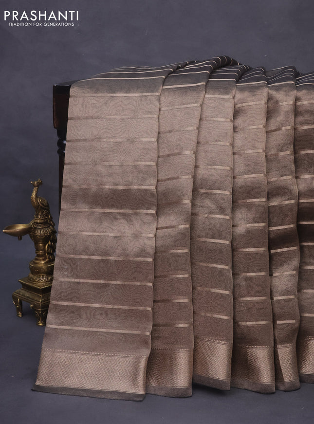 Tissue saree dual shade of grey and black with allover zari woven stripes pattern and zari woven border - printed blouse