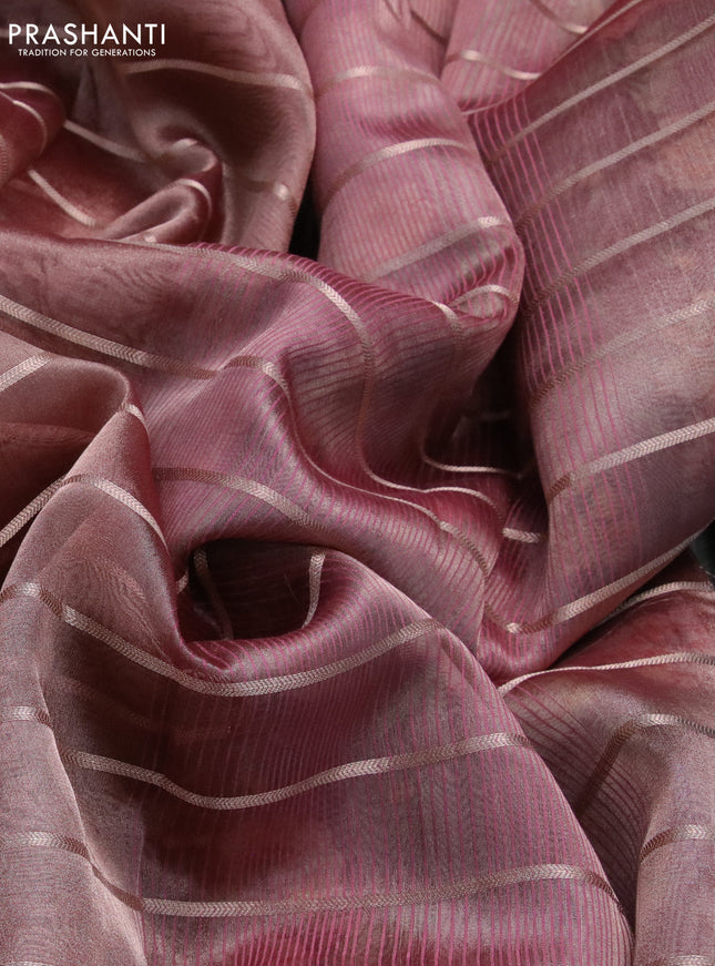 Tissue saree pastel maroon shade and deep maroon with allover zari woven stripes pattern and zari woven border - printed blouse