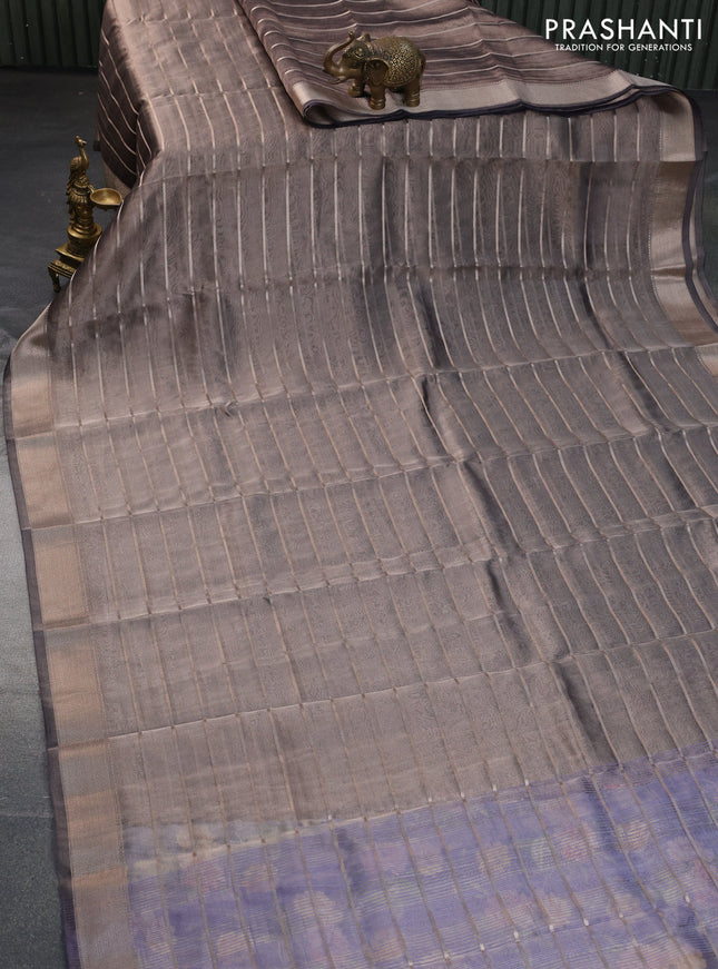 Tissue saree grey shade and blue with allover zari woven stripes pattern and zari woven border - printed blouse