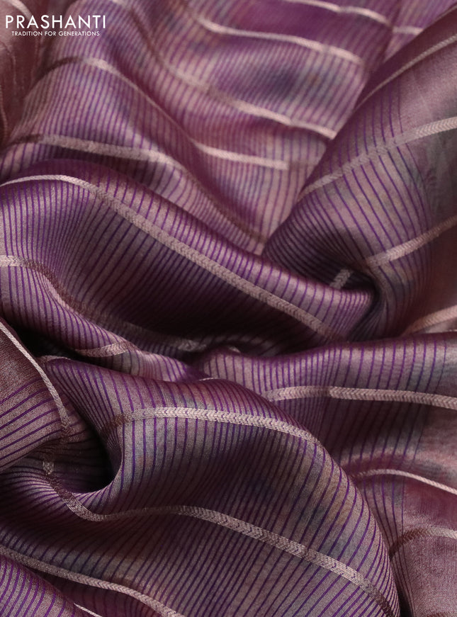 Tissue saree dual shade of wine and purple with allover zari woven stripes pattern and zari woven border - printed blouse