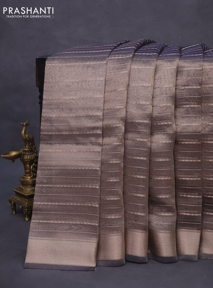 Tissue saree dual shade of grey and blue with allover zari woven stripes pattern and zari woven border - printed blouse