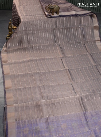 Tissue saree dual shade of grey and blue with allover zari woven stripes pattern and zari woven border - printed blouse