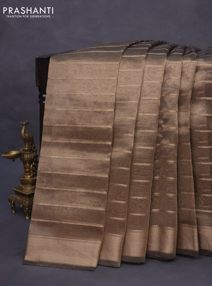 Tissue saree dual shade of grey and black with allover zari woven stripes pattern and zari woven border - printed blouse