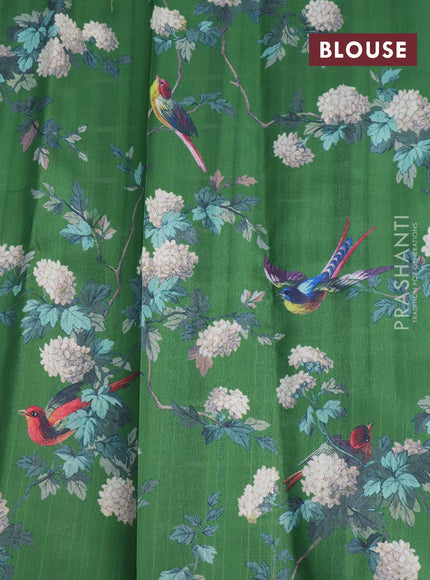 Tissue saree dual shade of green and green with allover zari woven stripes pattern and zari woven border - printed blouse