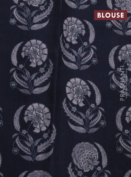 Tissue saree dual shade of grey and black with allover zari woven stripes pattern and zari woven border - printed blouse