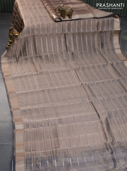 Tissue saree grey shade and black with allover zari woven stripes pattern and zari woven border - printed blouse