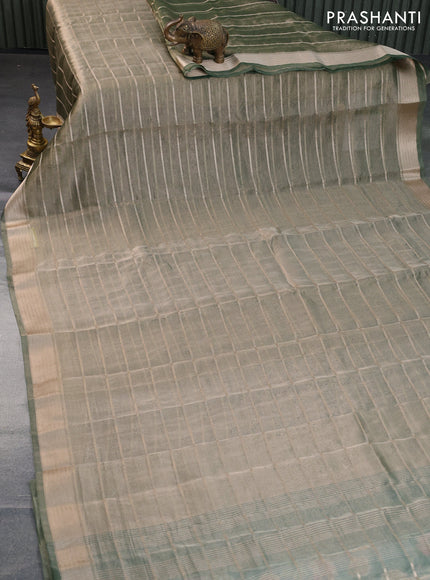 Tissue saree dual shade of green and green with allover zari woven stripes pattern and zari woven border - printed blouse