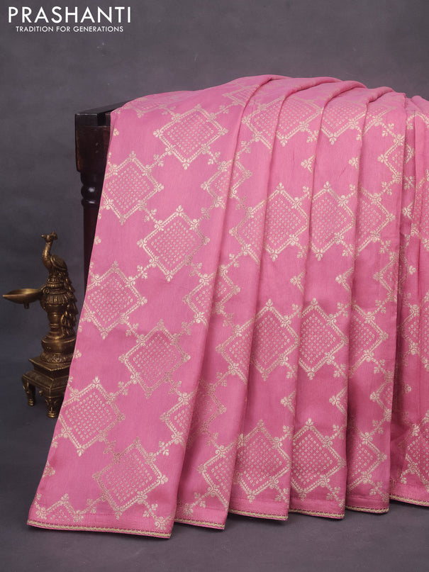 Munga tussar saree mauve pink with allover zari weaves and lace work border