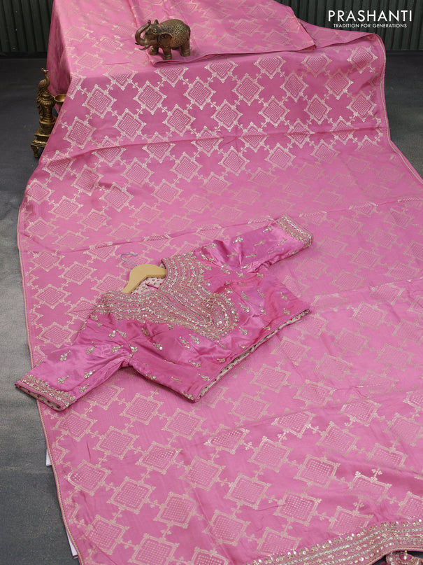 Munga tussar saree mauve pink with allover zari weaves and lace work border