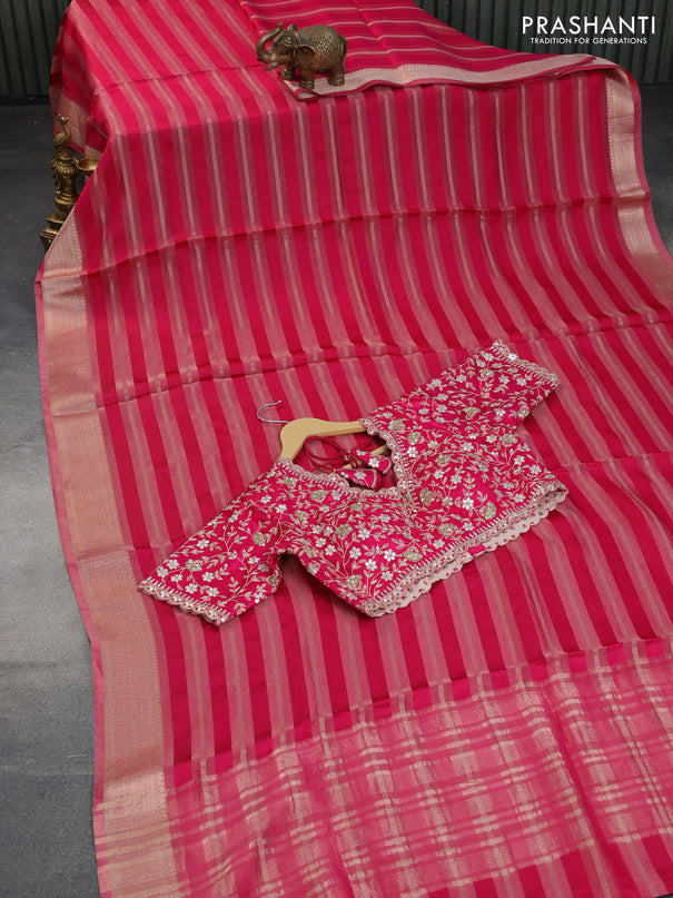 Organza saree pink with allover zari weaves and zari woven border