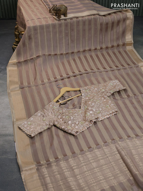 Organza saree grey with allover zari weaves and zari woven border