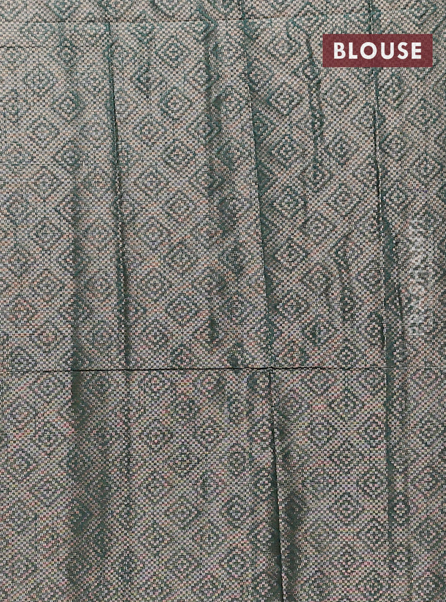Banarasi matka tissue saree bottle green with allover zari woven brocade weaves and temple design border