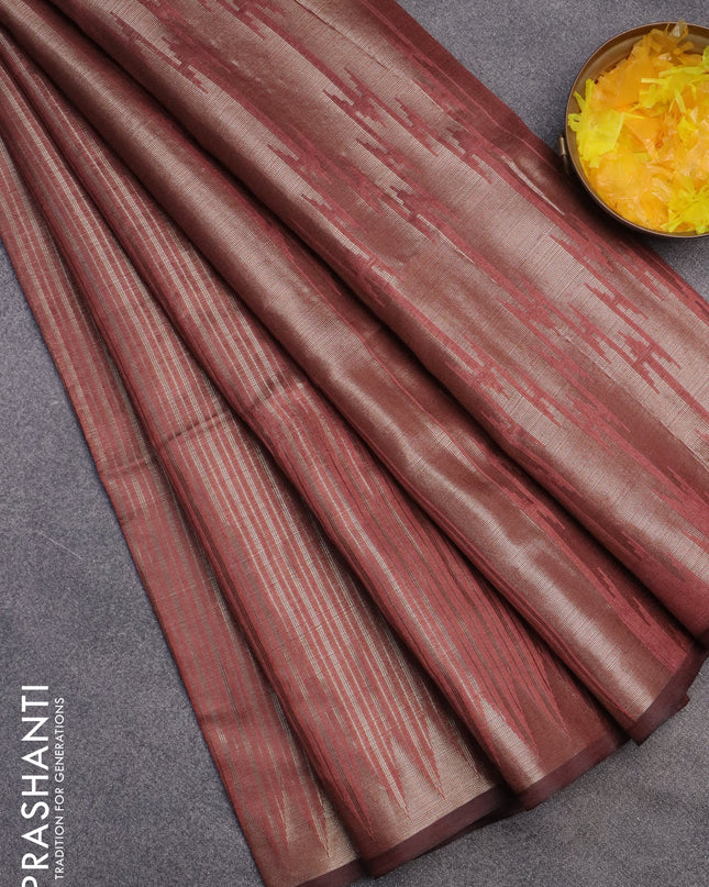 Banarasi matka tissue saree pastel peach with allover zari weaves and temple deisgn zari woven border