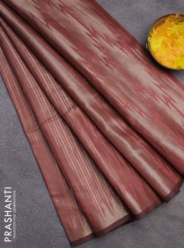 Banarasi matka tissue saree pastel peach with allover zari weaves and temple deisgn zari woven border
