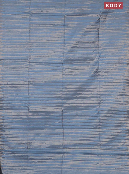 Banarasi matka tissue saree pastel blue with allover zari weaves and temple deisgn zari woven border