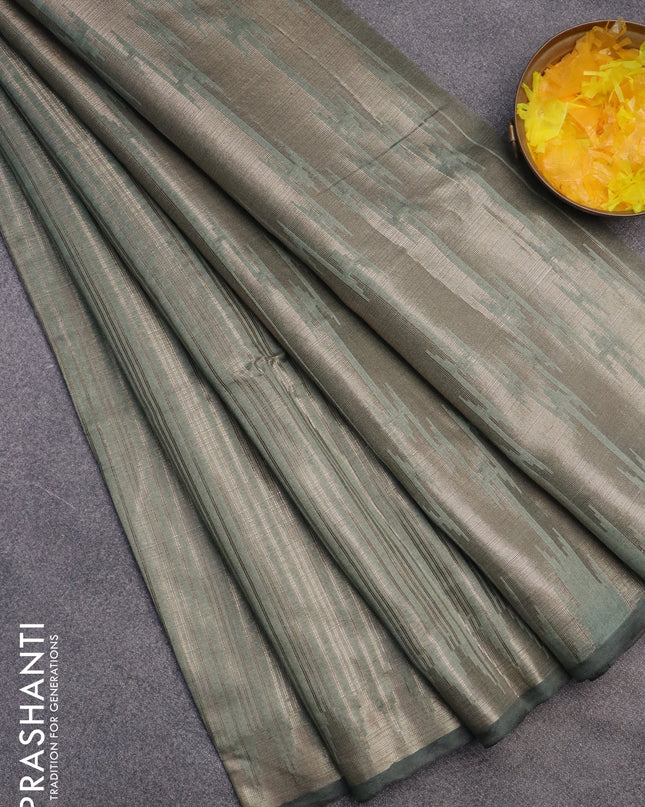 Banarasi matka tissue saree pastel green with allover zari weaves and temple deisgn zari woven border