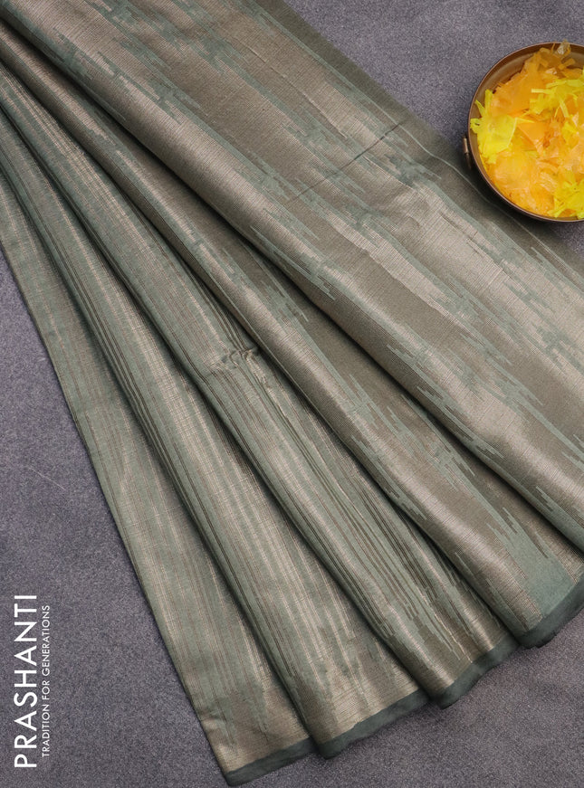 Banarasi matka tissue saree pastel green with allover zari weaves and temple deisgn zari woven border