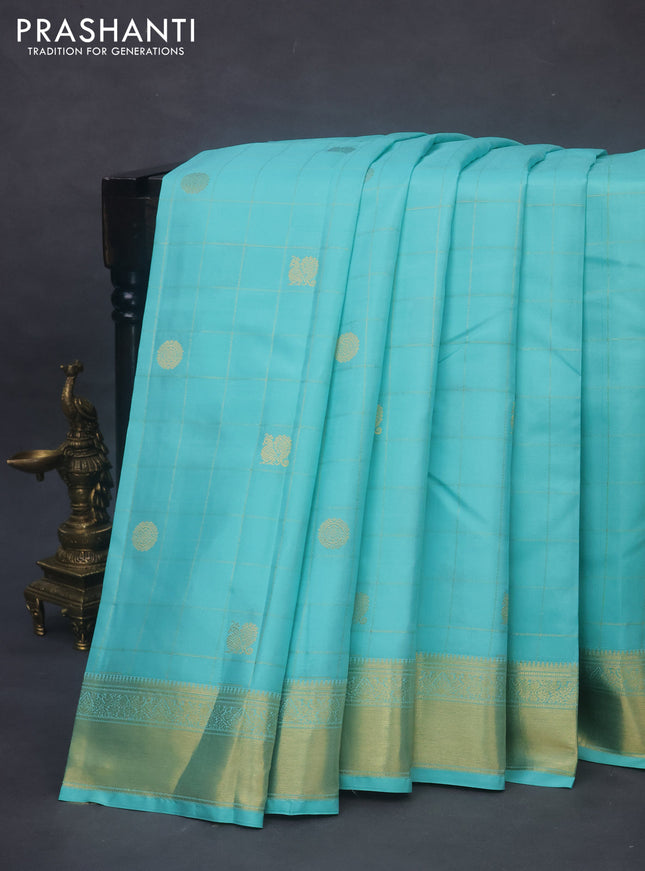 Pure kanchipuram silk saree teal blue shade and red with allover zari checks & buttas and rich zari woven border