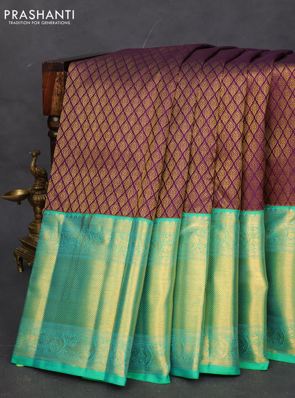 Pure kanchipuram silk saree deep purple and teal green with allover zari woven brocade weaves and long zari woven korvai border