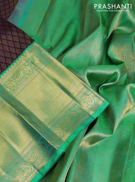 Pure kanchipuram silk saree deep purple and teal green with allover zari woven brocade weaves and long zari woven korvai border