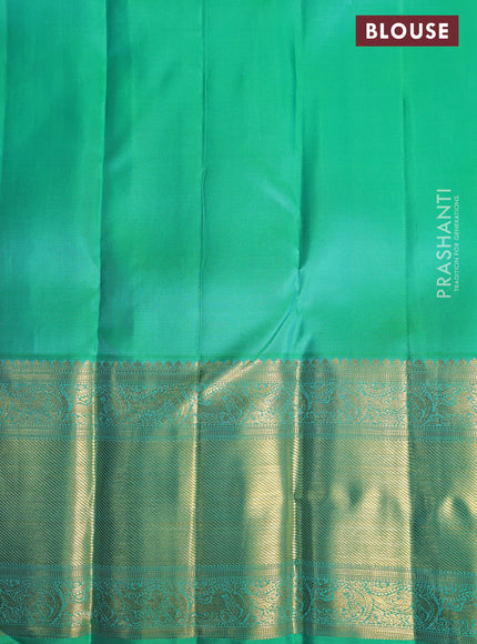Pure kanchipuram silk saree deep purple and teal green with allover zari woven brocade weaves and long zari woven korvai border
