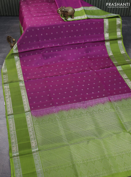 Pure soft silk saree purple and light green with allover zari woven buttas and rettapet zari woven border
