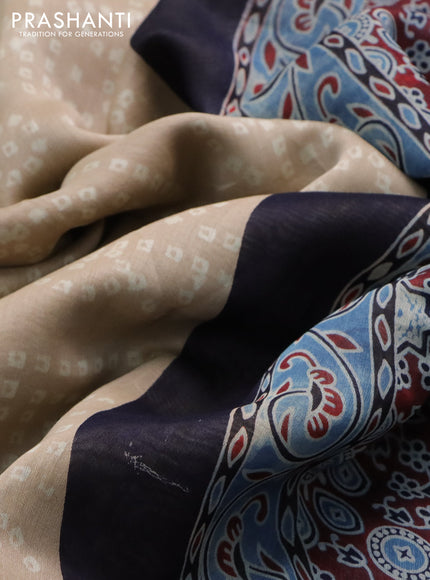 Chanderi bagru saree beige and blue with allover bandhani prints & ajrakh printed pallu and zari border & ajrakh printed pallu