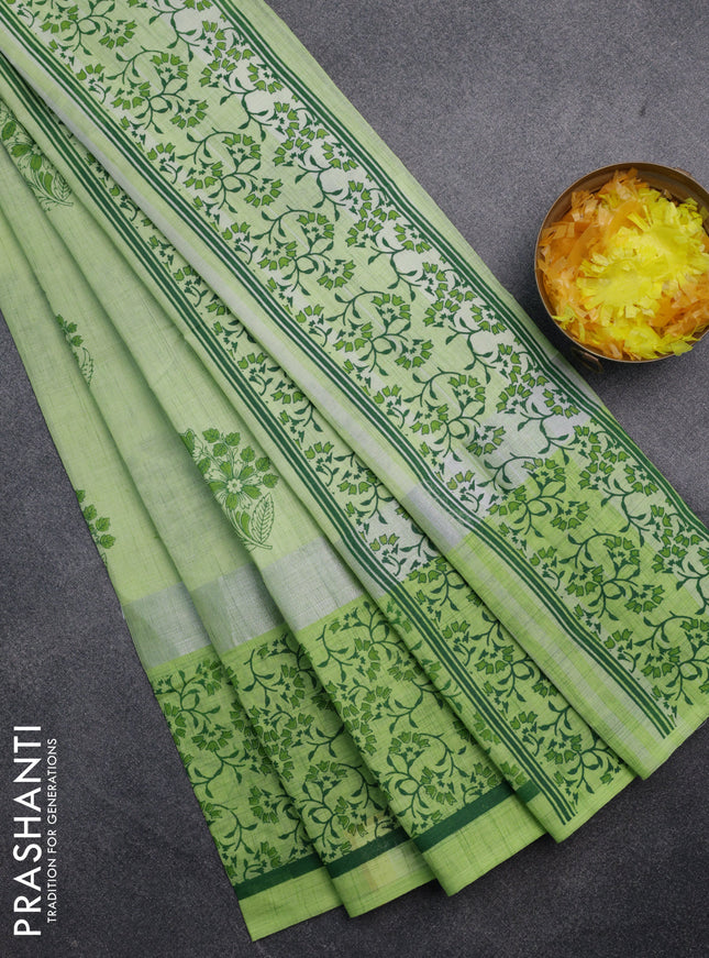 Chirala cotton saree pista green with floral buttas and silver zari woven printed border