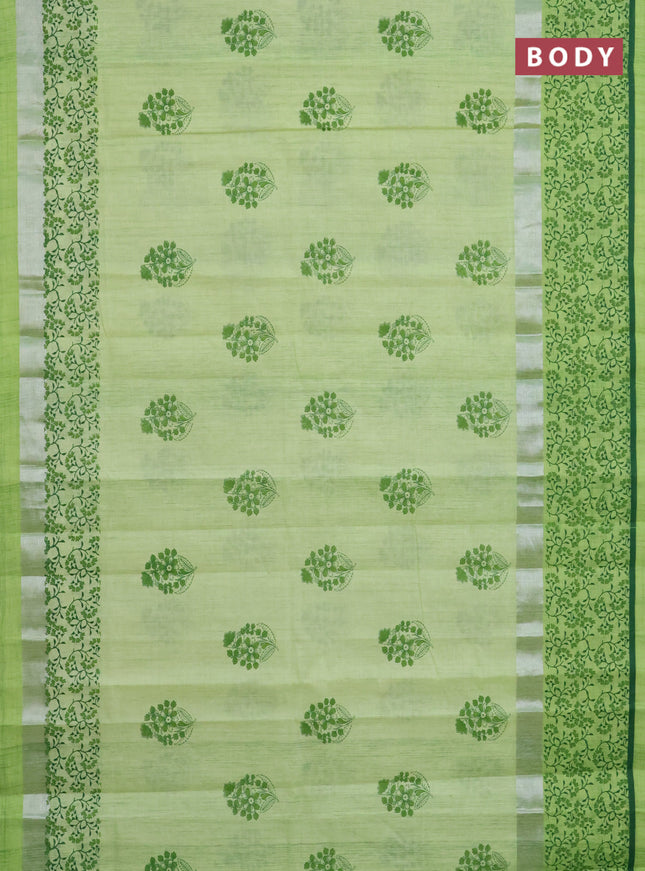 Chirala cotton saree pista green with floral buttas and silver zari woven printed border