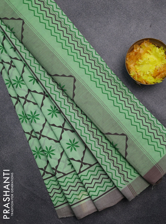 Chirala cotton saree light green and grey with allover prints and printed border