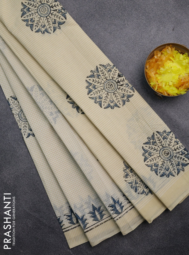 Chirala cotton saree cream and blue shade with butta prints and printed border