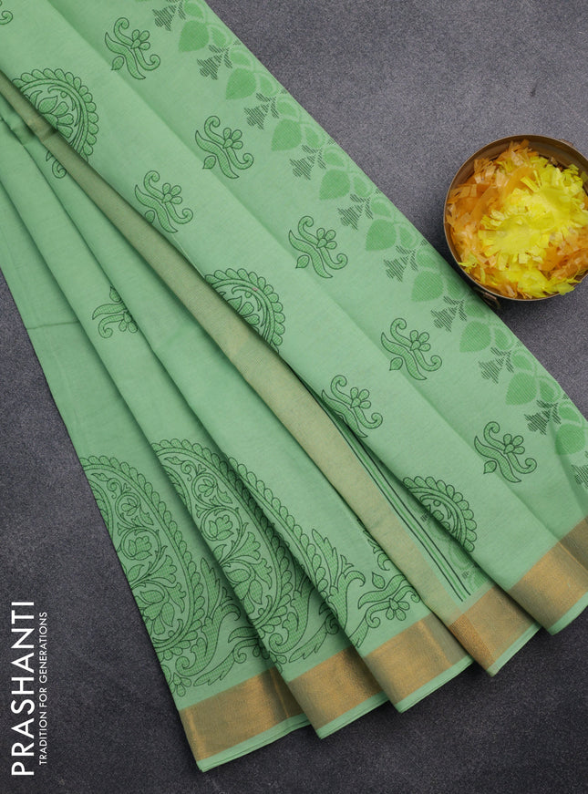 Chirala cotton saree light green with butta prints and paisley printed zari border