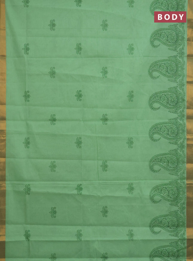 Chirala cotton saree light green with butta prints and paisley printed zari border