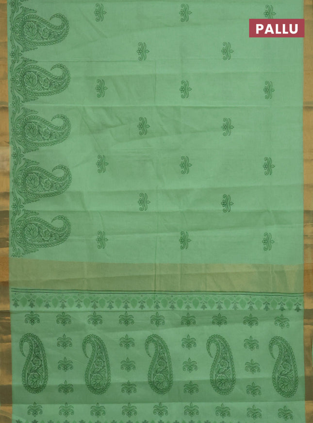 Chirala cotton saree light green with butta prints and paisley printed zari border