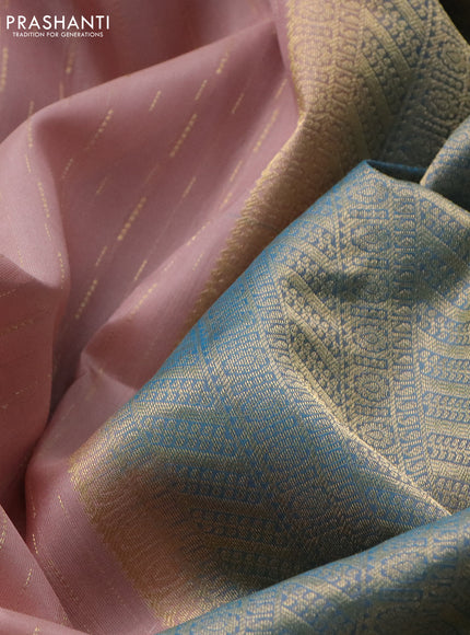 Pure kanchipuram silk saree pastel pink and cs blue with allover zari weaves and long zari woven border